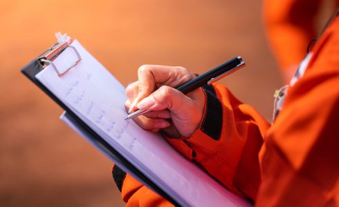safety-officer-supervisor-is-writing-note-on-the-checklist-paper-during-perform-audit-and-inspection-1300pxs